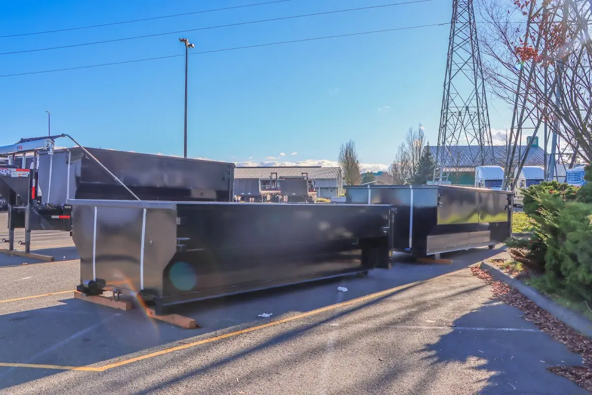 Roll-off dumpster ready for waste disposal at job site for Construction Dumpster Rental in On Top of the World